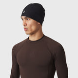 LYCRA® ADAPTIV Baselayer Longsleeve in dark earth worn by model, side profile view