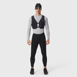 LYCRA® ADAPTIV Baselayer Longsleeve in slate grey worn with black vest and leggings, front view