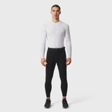 White LYCRA® ADAPTIV Baselayer Longsleeve worn with black leggings, front view