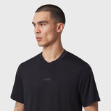 Black Polartec® Delta Polo worn by model, front side profile view