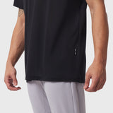 Black Polartec Delta Polo worn by model, front side view