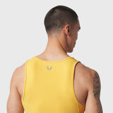 LYCRA® ADAPTIV Baselayer Tank in amber yellow, back view on model