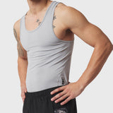 LYCRA® ADAPTIV Baselayer Tank in slate grey worn by model, front view
