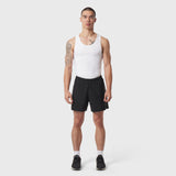 White LYCRA® ADAPTIV Baselayer Tank on model with black shorts, front view