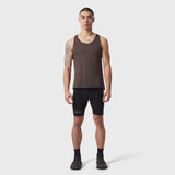 Polartec® Delta Singlet in dark earth worn by male model with black shorts, front view