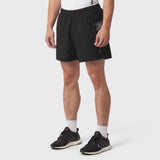Tetra-Lite Adventure Short in black, worn by model with white socks and black sneakers