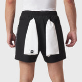 Tetra-Lite Adventure Short in black with white side panels, worn by model, back view