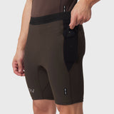 Dark earth Lycra ribbed run half-tight shorts on model, side view with pocket detail