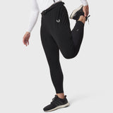 Black hybrid belt-pack run jogger worn by model in running pose, side view