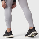 Slate grey hybrid belt-pack run jogger worn by model, calf-length view with black sneakers