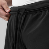 Black Aerotex bonded 7" liner short being held up, showing waistband and drawstring detail