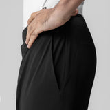 Black Aerotex bonded 7" liner short worn by model, side view showing fabric detail