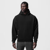 Tech-Terry Zip Pocket Hoodie in black, worn by model, front view