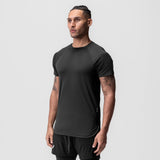 AeroSilver Established Tee in black, worn by model in three-quarter front view