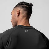 AeroSilver Fitted Tee in black worn by model, back view showing ASRV logo