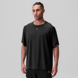 Ice-Skin™ Oversized Tee in black, worn by model facing forward