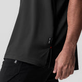 AeroSilver Oversized Tee in black worn by model, side detail view