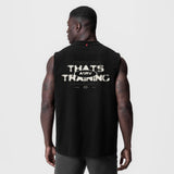 Black LE Tech Essential relaxed cutoff tank top with 'THAT'S TRAINING' graphic, back view on model
