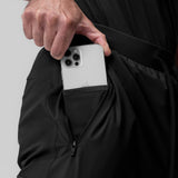Black Tetra-Lite Ice Cargo High Rib Jogger worn by model, detail of phone in pocket