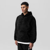 Black Sherpa Recovery Hoodie worn by model, three-quarter view