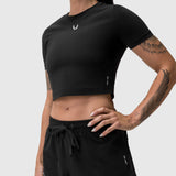 Black LYCRA® cropped tee worn by model, front view