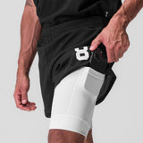 SilverPlus Mesh 5" Liner Short in Black/White, model wearing shorts with phone in pocket