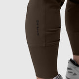 Tetra-Lite Cargo High Rib Jogger in Dark Earth, worn on model, side view