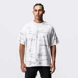CottonPlus™ Oversized Tee in white camo, worn by model, front view