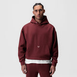 Tech-Terry Hoodie in crimson worn by male model, front view