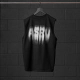 Tech Essential Relaxed Cutoff tank in black with motion blur graphic, back view on hanger