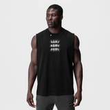 Black Tech Essential Relaxed Cutoff tank top worn by model, front view