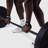 Padded Lifting Straps in black worn on wrists during deadlift exercise