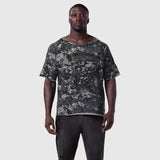 Vintage Raw Hem Pump Cover in pixel camo, worn by model, front view