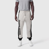 Tech-Terry Mesh Panel Sweats in heather grey with black panels, worn by model, front view