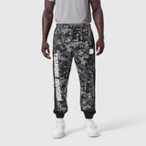 Tech-Terry Mesh Panel Sweats in pixel camo black, worn by model with white sneakers, front view