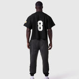 Ion-Mesh™ Crop Jersey in black with white number 8 on back, worn by model, rear view