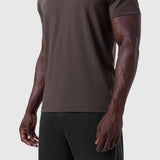 Supima Essential Tee in Dark Earth worn by model, side view showing fit