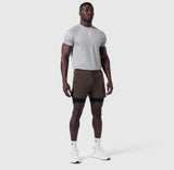 Tetra-Lite 5" Liner Short in Dark Earth and Black, worn by model standing facing forward
