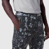 Tetra-Lite Cargo High Rib Jogger in pixel camo, worn by model showing side view with hand in pocket