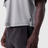Ion-Mesh Crop Jersey in slate grey worn by model, side view detail