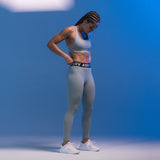 W071 Lycra Ribbed Legging in light sky, worn by model standing against blue background
