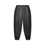 flatlay of black Tech-Terry Mesh Panel Sweats joggers with mesh side panels, front view