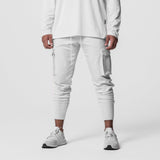 Tech-Terry Cargo High Rib Jogger in white, modeled from waist down with hands at pockets