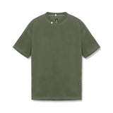 flatlay Tech Essential Relaxed Tee in faded olive, front view