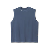 flatlay Tech Essential Relaxed Cutoff sleeveless tank in faded navy, front view