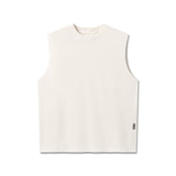 flatlay Tech Essential Relaxed Cutoff sleeveless tank in faded stone, front view