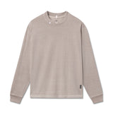 flatlay Tech Essential Relaxed Long Sleeve in faded chai, front view