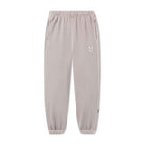 flatlay Tech Essential Sweats joggers in faded chai, front view