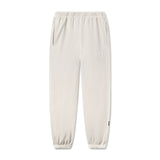 flatlay Tech Essential Sweats joggers in faded stone, front view