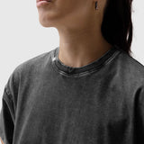 Distressed Relaxed Tee in black, worn by model, side view